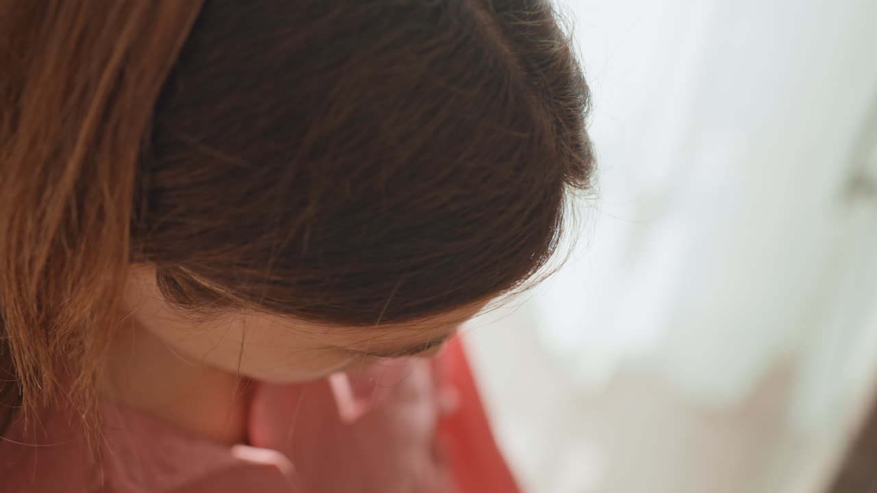 Woman With Pet Enjoying Quiet Moment, Domestic Scene Showing Woman And Pet In Peaceful Connection, Soft Focused Image Capturing Woman Reaching Towards Her Pet In Tender Gesture At Home