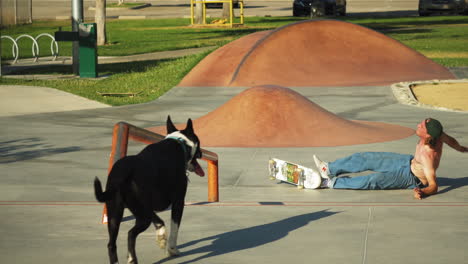 A-skateboarder-takes-a-fall-as-he-fails-to-land-his-stunt