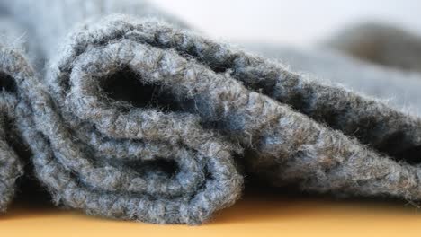 close-up of rolled gray blanket