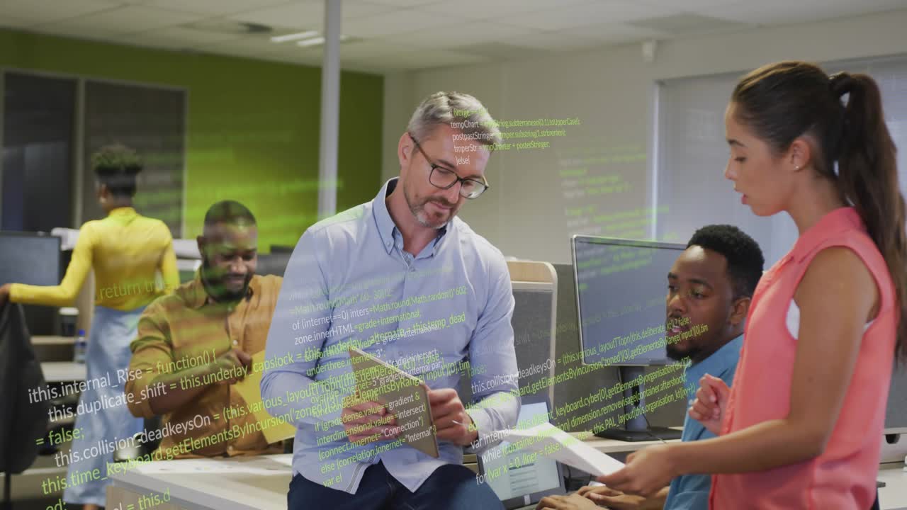 Coordinator handing reports while team reviewing tablet with animated code guiding tech planning