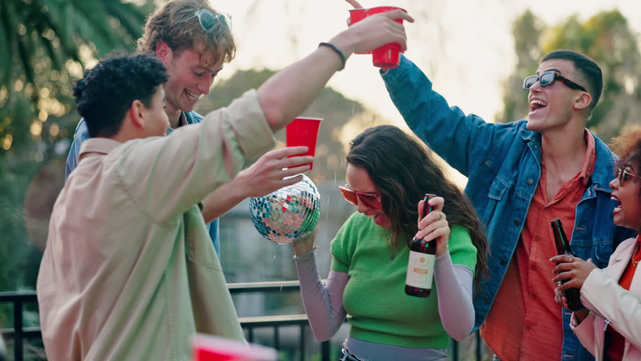 Friends Celebrating with Beer and Disco Ball