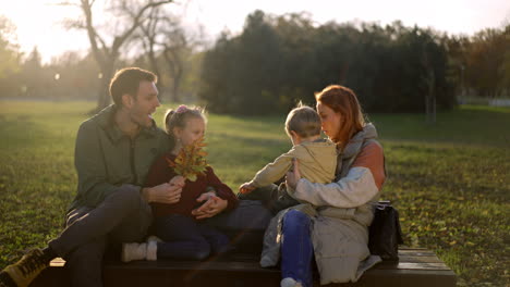 Family enjoying autumn in the park
