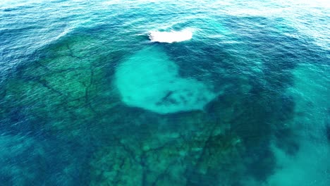 turquoise sea and coral reef in nsw, australia - drone shot