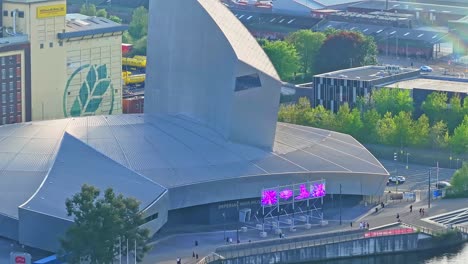 aerial view of imperial war museum in media city uk district in manchester, modern building architecture