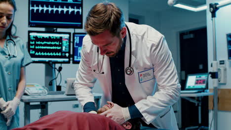 doctor performing cpr in hospital