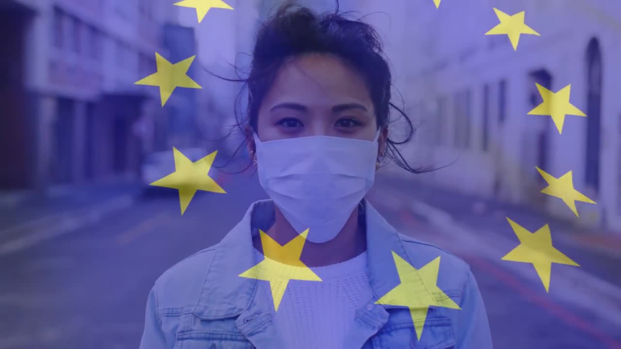 animación de la bandera de la ue ondeando sobre una mujer con máscaras faciales