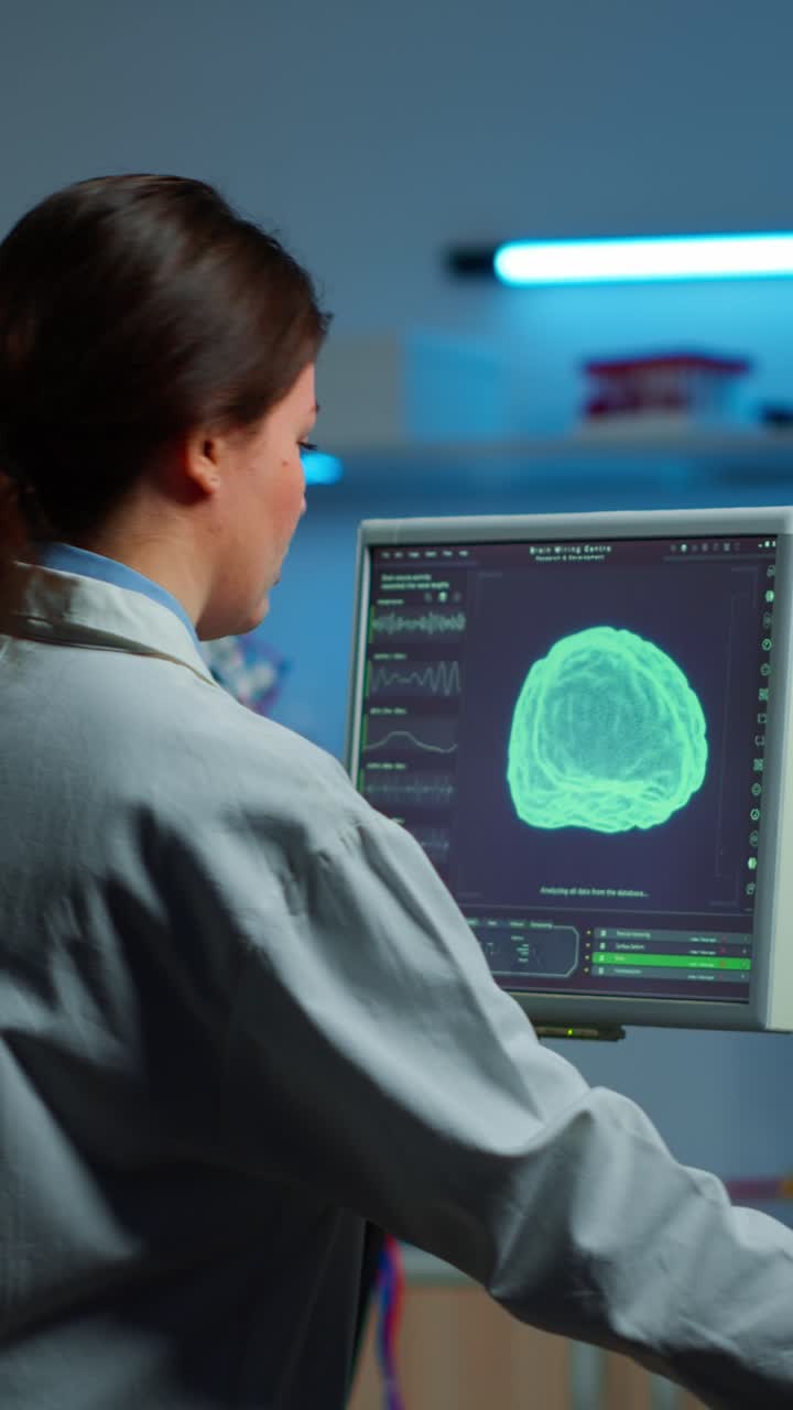 Scientists conducting brain activity analysis using EEG technology in a research lab
