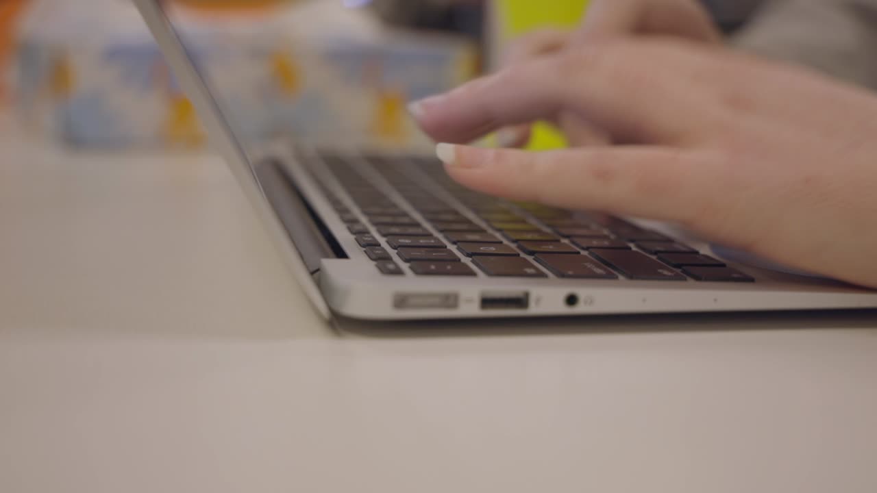 Woman Hands Typing Blog Article On Laptop Computer Keyboard, Close Up