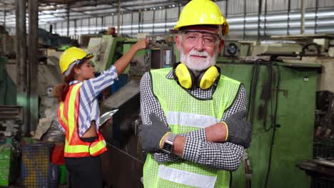 senior factory worker or engineer close up portrait in factory