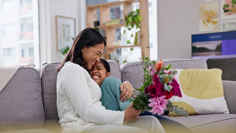 Mothers-day-gift,-girl-and-flowers-on-couch