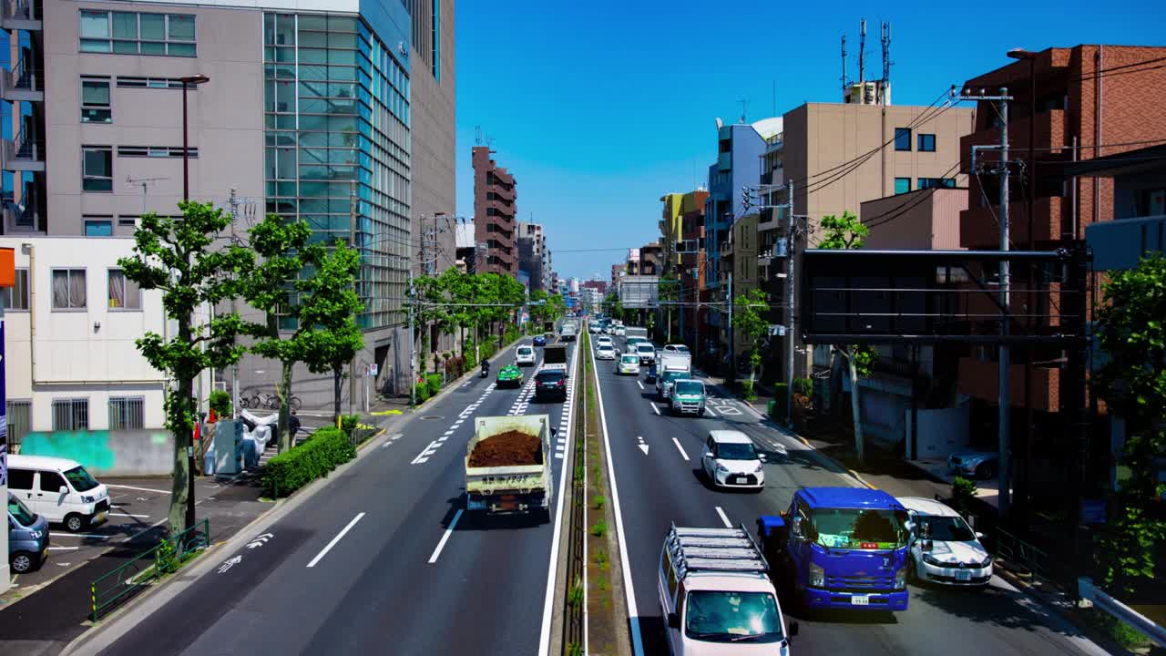 도쿄의 도시 거리에서 교통 체증의 타임 스 긴