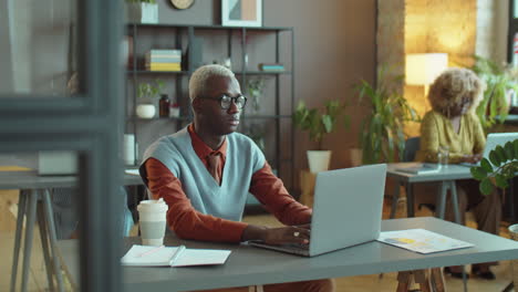 african american businessman working in office