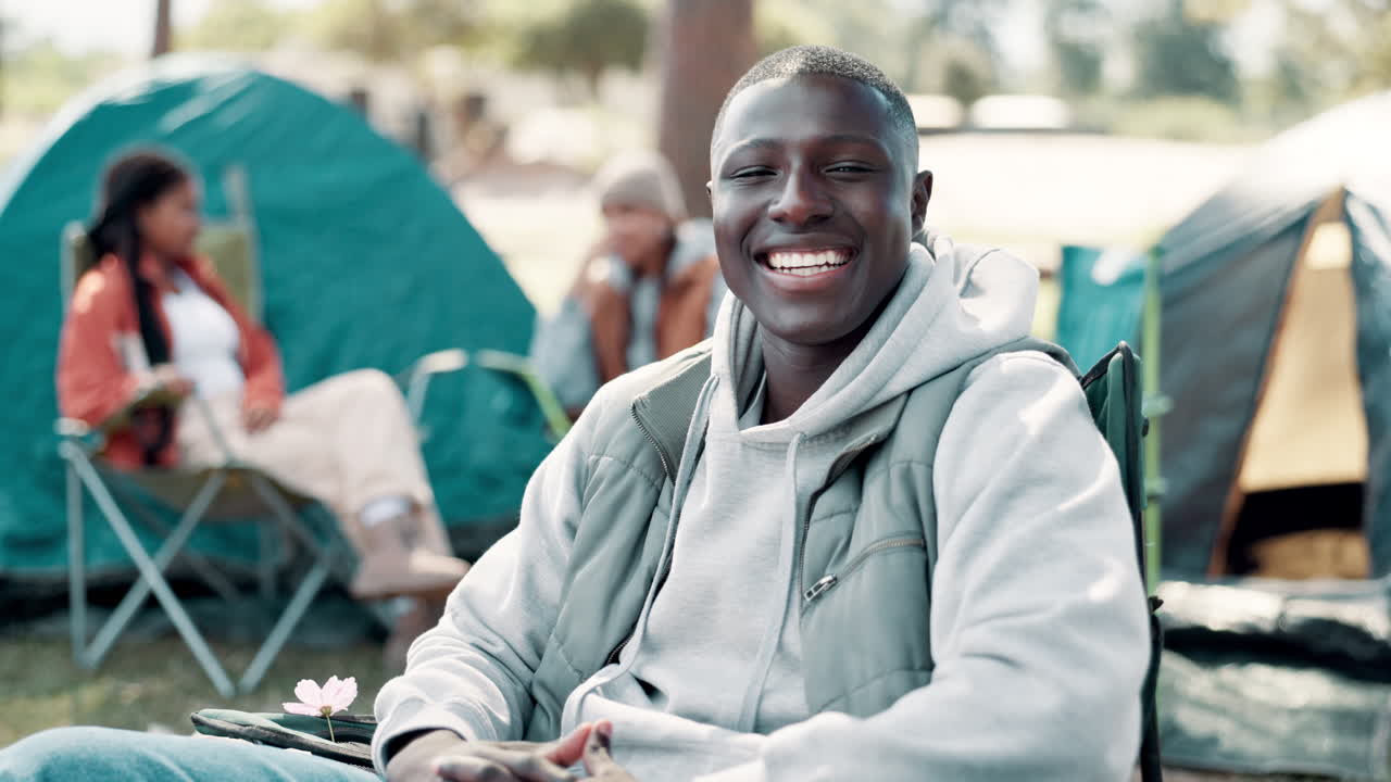 Friends camping outdoors and enjoying their time