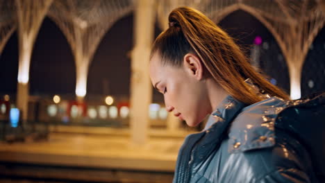 Sad-girl-walking-urban-gothic-street-evening-close-up.-Woman-going-on-night-city