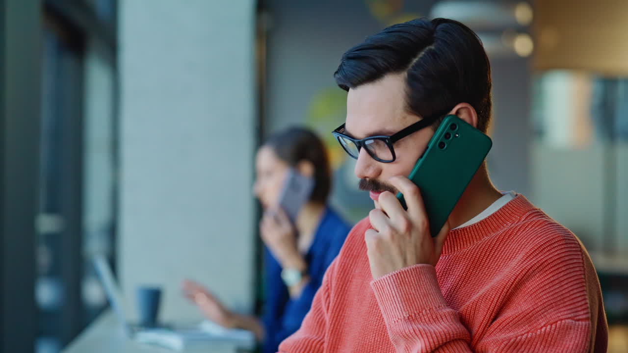 Team consultants calling clients sitting coworking office closeup. Two managers