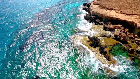 crystal clear turquoise blue water at sea caves ayia napa cyprus view