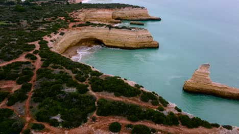 aerial footage from the algarve coast's aqua colored water