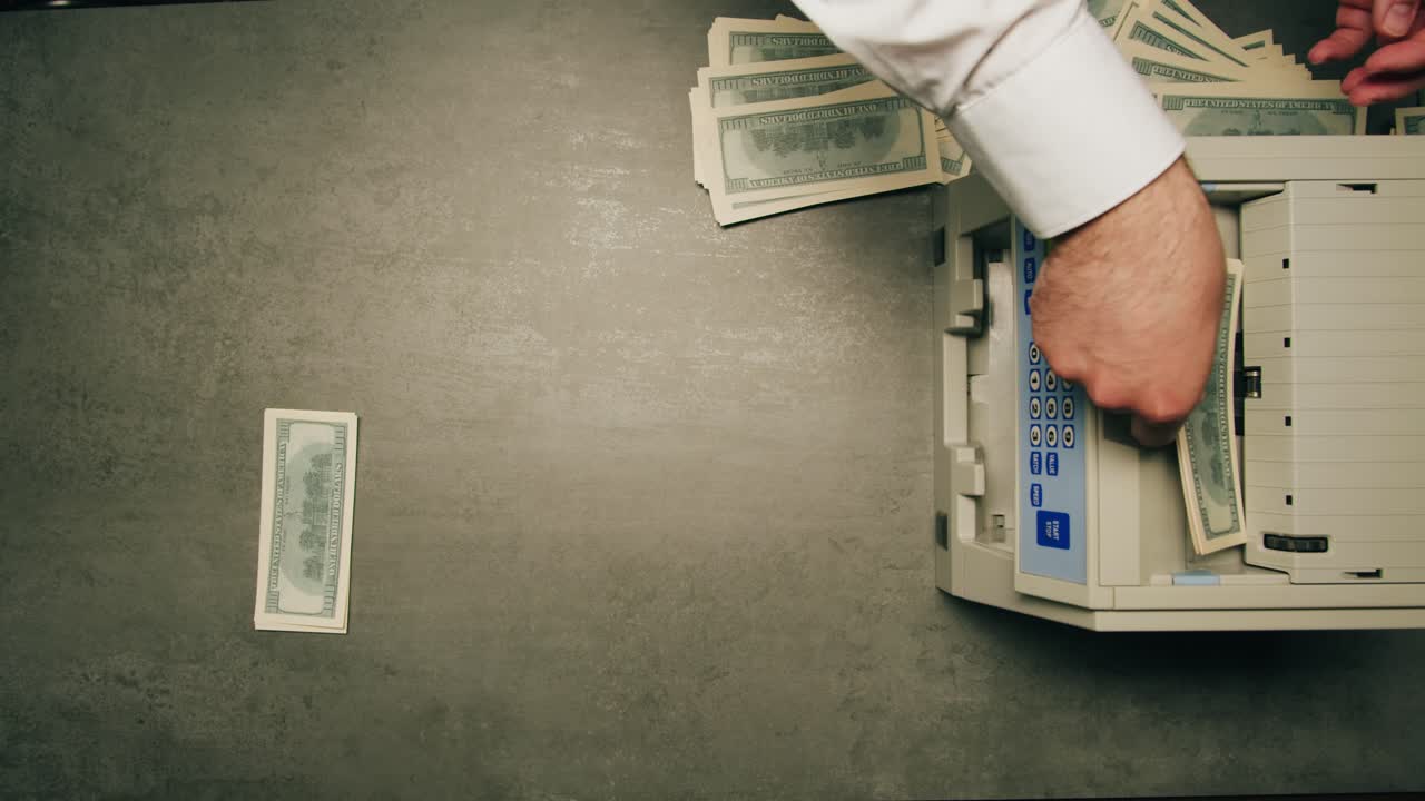 Specialised police officer Counting dollar banknotes in crime lab, conceptual image. High quality 4k footage