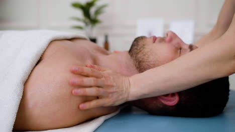 massage therapist with client