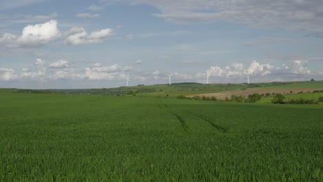 Landscape-of-agricultural-farmland-with-wind-turbines-setup,long-shot