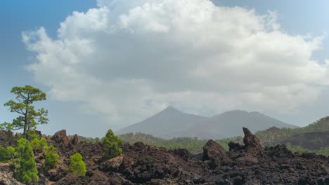 teide volcano mount with white clouds rolling above, time lapse shot