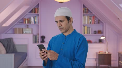 muslim man chatting on phone