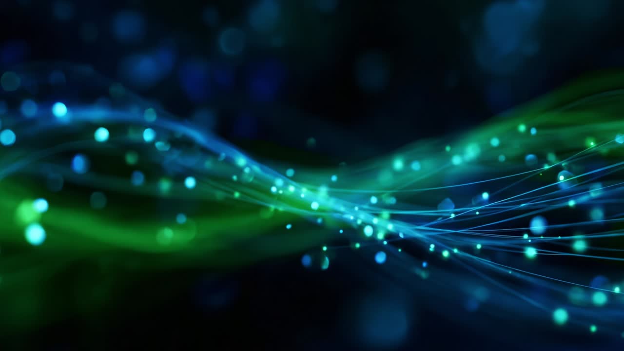 A mesmerizing display of flowing light waves, illuminated by vibrant blue and green hues, depicting the dynamic interplay of color and movement in an abstract digital design that captivates the viewer's imagination