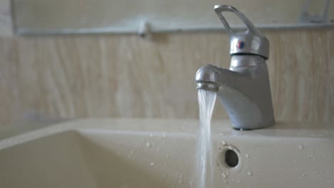 running water from bathroom tap