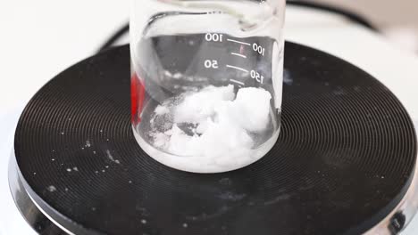 sodium acetate crystallizing in a laboratory beaker