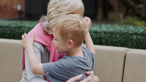 grandmother and grandson sharing a heartfelt hug