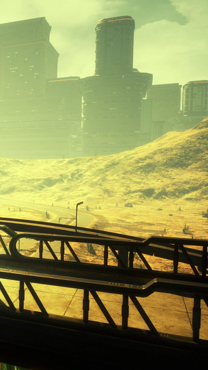 Landscape with a bridge and a distant city during hazy daylight