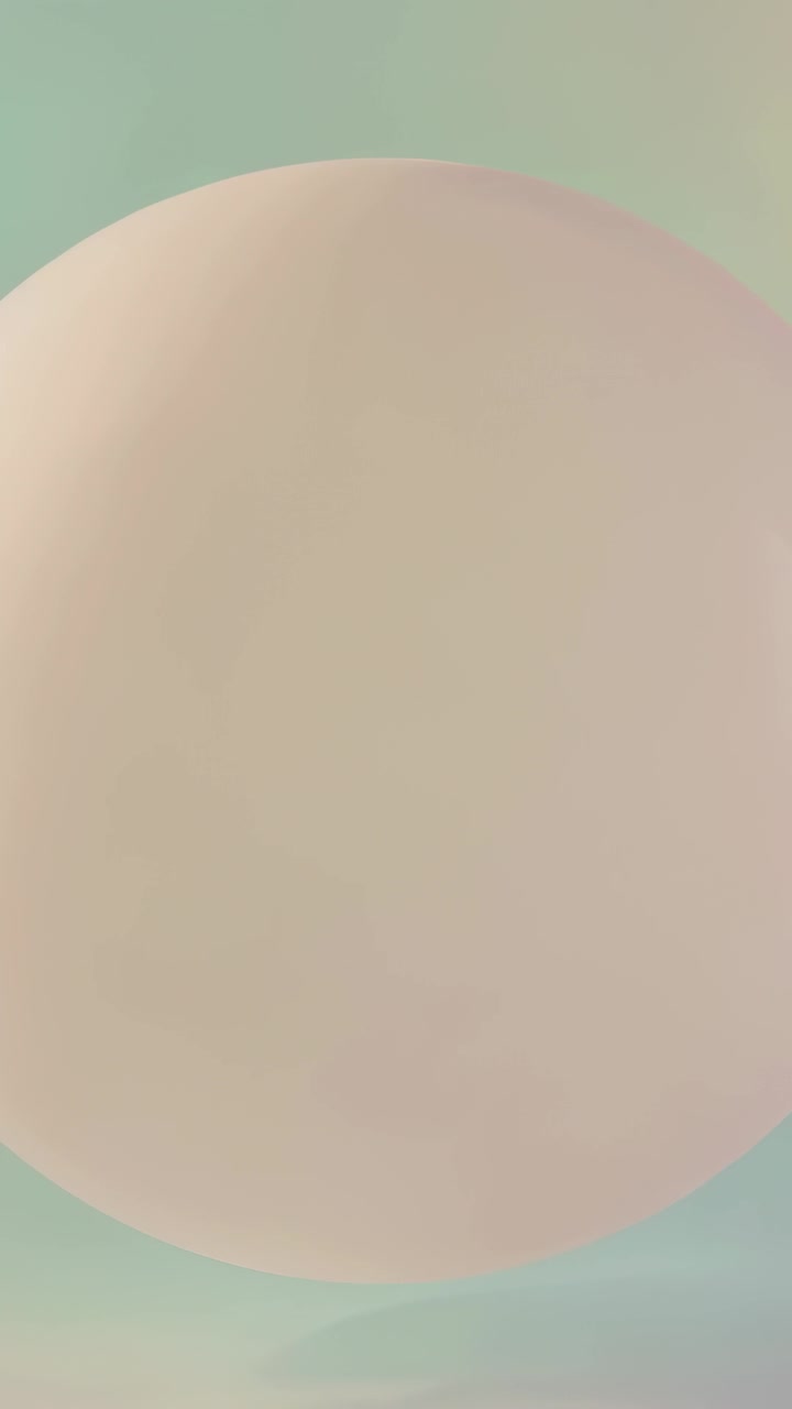 Vertical video: Loop starting, pale orb drifting in teal-peach backdrop, mist rising for calm