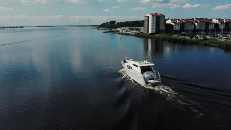 Luxurious-white-yacht-sailing-on-water