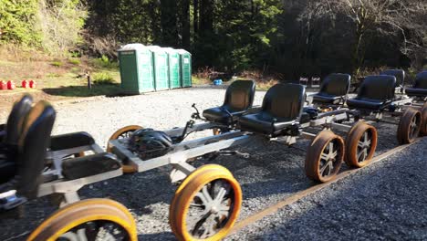 gimbal moving shot of railbikes lined up on the tracks at glen blair junction in northern california. 4k