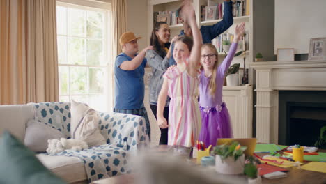 happy-multiracial-family-dancing-at-home-having-fun-enjoying-dance-celebrating-exciting-weekend-together-4k-footage