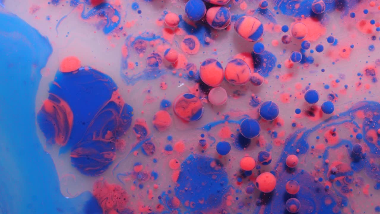 Slow Motion Bright Colors Blue and Pink Bubbles Oil Beautiful Paint Universe Color Moving Multicolored. Acrylic Paint. Fantastic Hypnotic Surface. Abstract Colorful Paint Metamorphosis Structure.