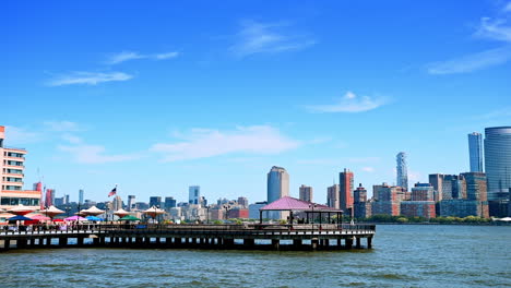 beautiful pier on the hudson river and skyline of gorgeous manhattan. watching new york from jersey city