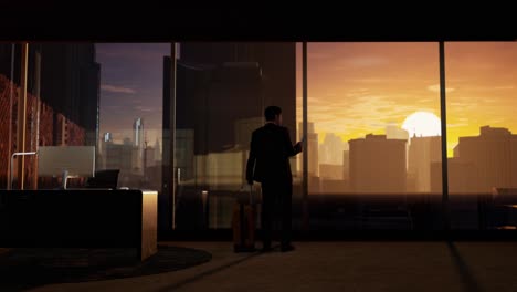 businessman at sunset window