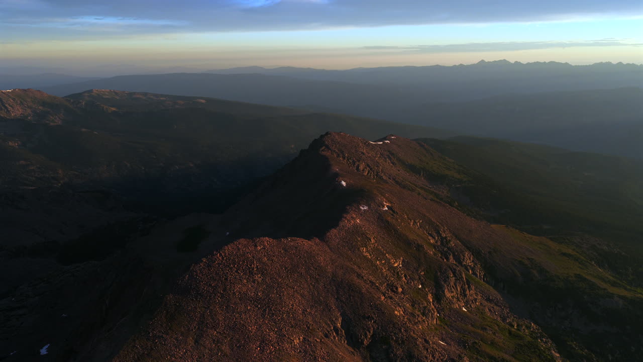 Notch Mountain Shelter Halo Ridge Half Moon Pass Trail landscape Mount of the Holy Cross wilderness aerial drone Colorado summer golden hour sunset clouds Rocky Mountains Sawatch Range forward motion