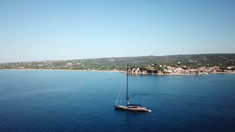 view of a sailing ship in the shore behind, greece