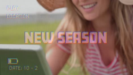 animation of new season text on video camera screen with digital interface and woman shopping online