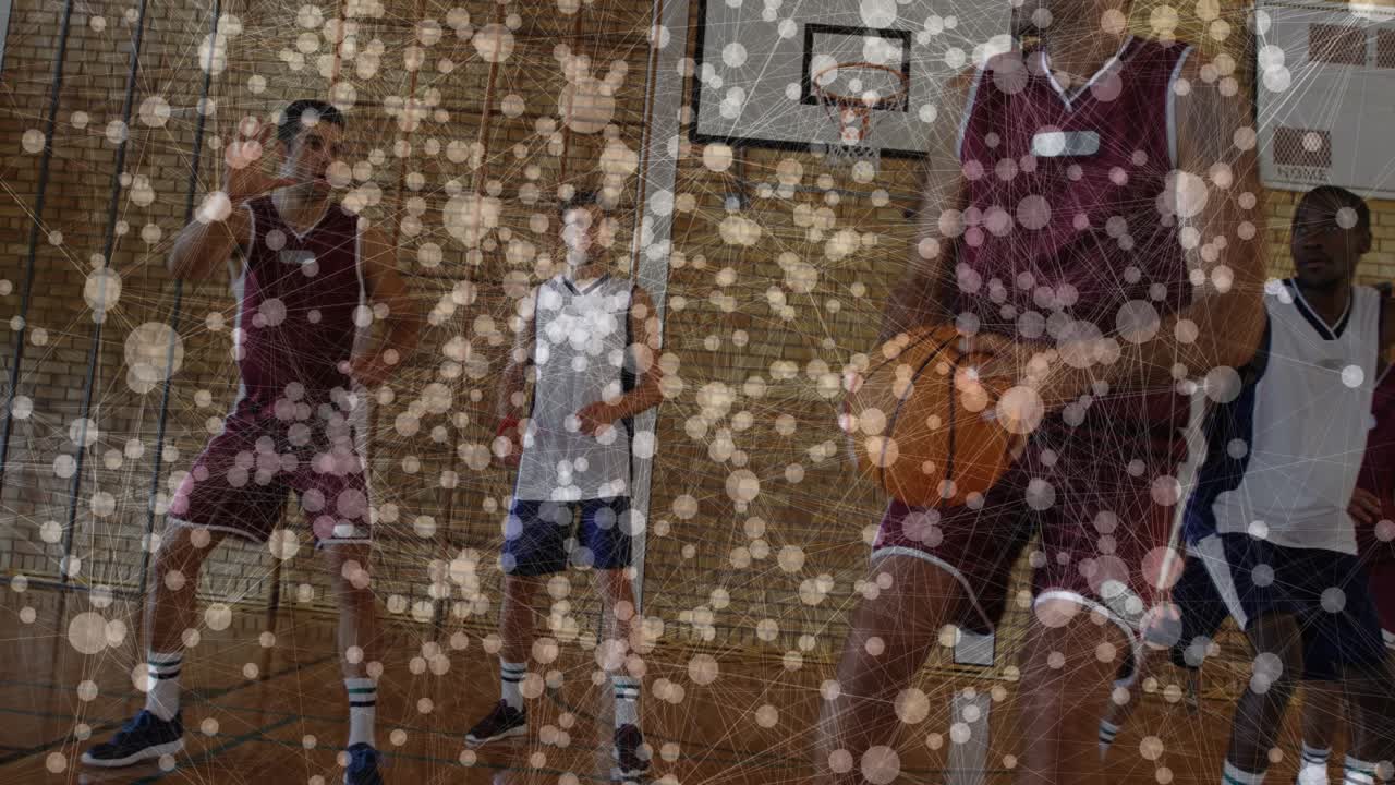 Maroon player getting pass pivoting driving under rim in sports to score, bokeh overlay obscuring