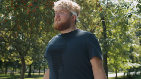 Obese-Man-Jumping-Rope-in-Park