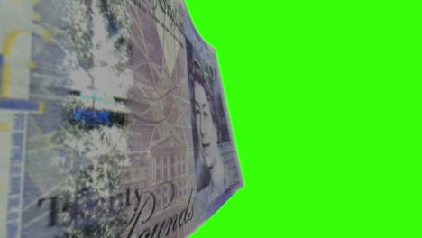 twenty british pounds banknote on green screen