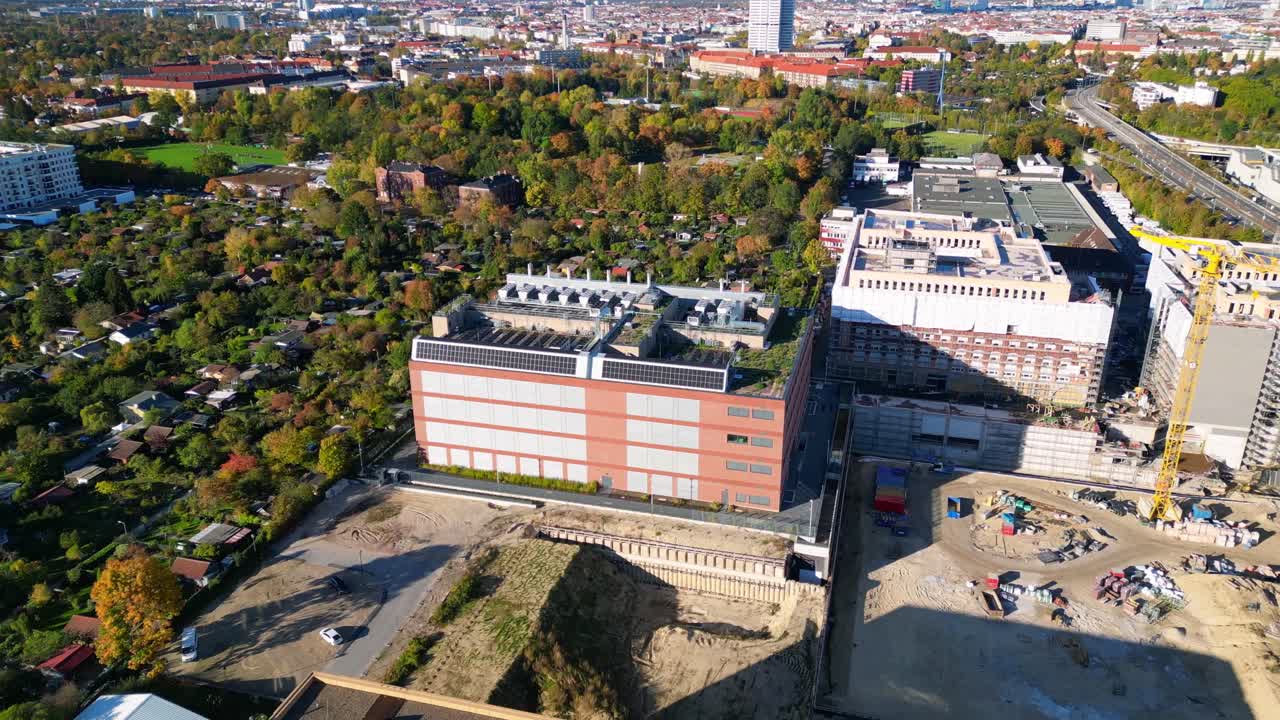 data center, computing center hyperscaler computer servers, cloud services, it services. Building exterior. Unique aerial view flight fly push forward drone