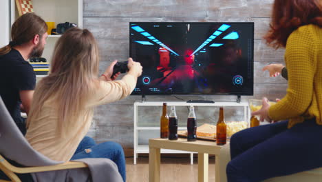 Back-view-of-game-over-for-young-woman-playing-video-games