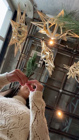 woman admiring christmas decorations