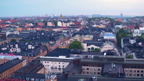 helicopter view of beautiful old buildings in downtown stockholm at sunset.