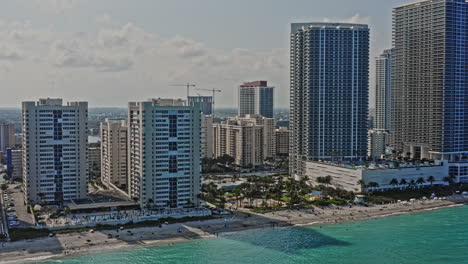 hallandale beach florida aerial v2 drone fly over luxury beachfront condo towers south city park reveals golden isles neighborhood, capturing the cityscape and coastal living lifestyle - march 2021