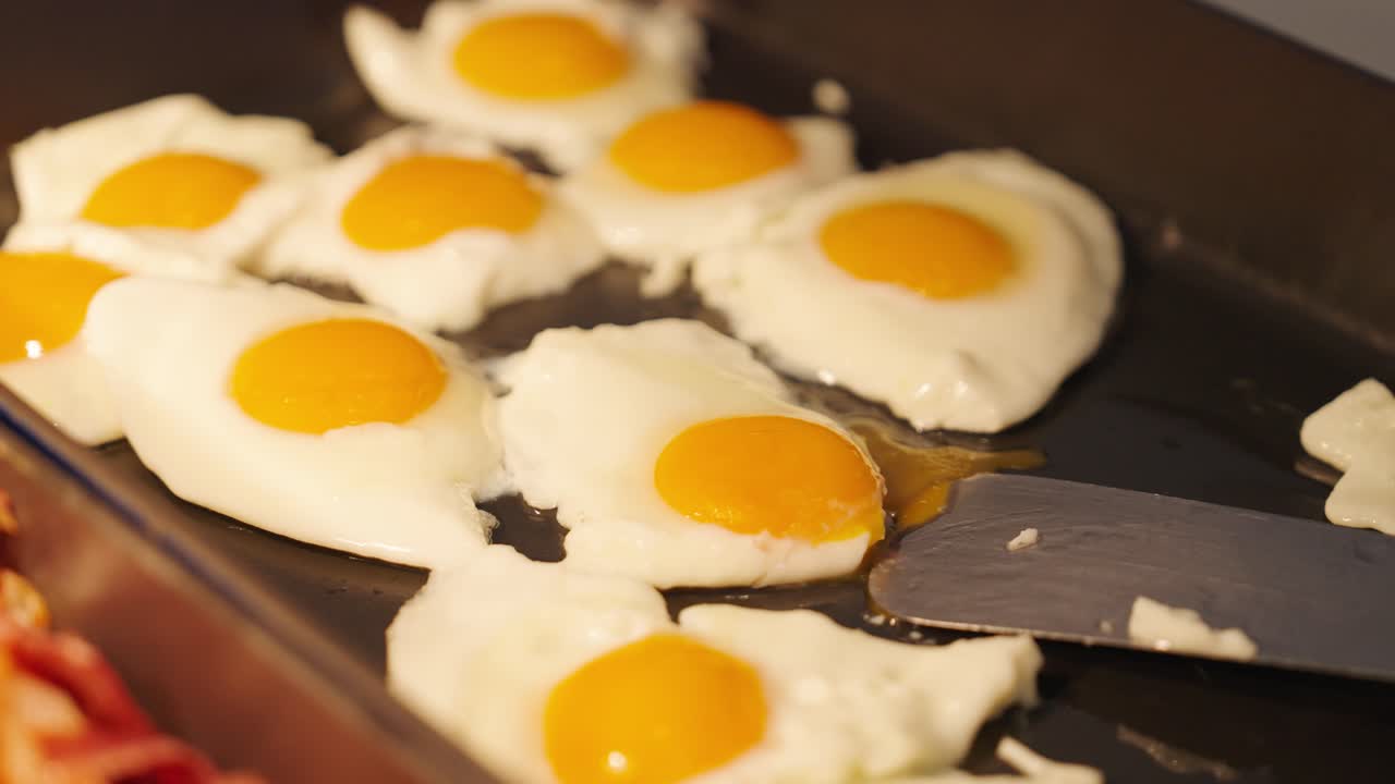 Delicious fried eggs in morning menu for breakfast, close up